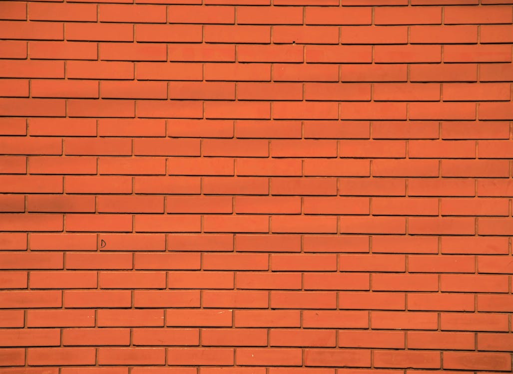 Gratis Muro Di Cemento Arancione Foto a disposizione