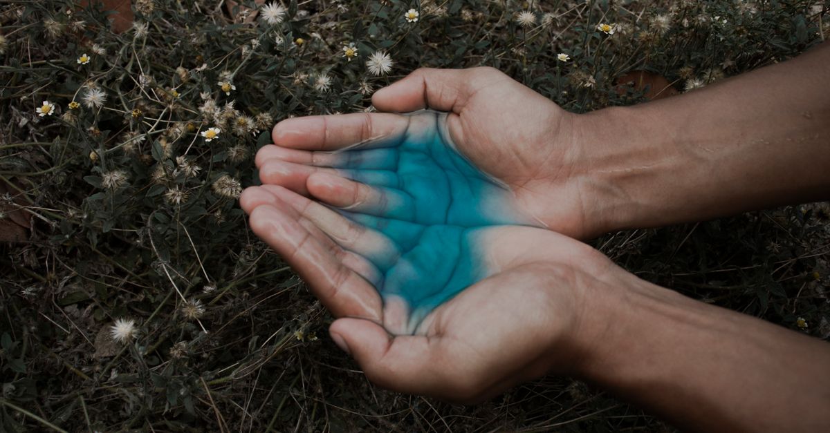 Hand Color Liquid Human Hand With Blue Liquid · Free Stock Photo