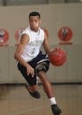 Man Dribbling Basketball