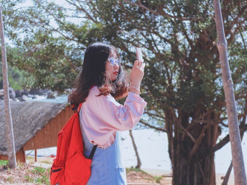 Photo Of Woman Holding Phone