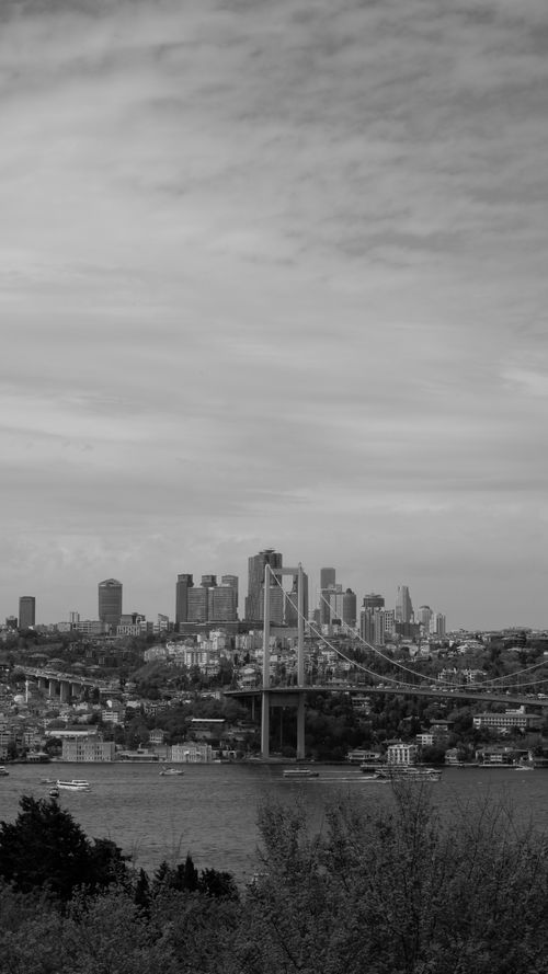 Free Black and white view of Bosphorus Bridge with Istanbul skyline in the background. Stock Photo