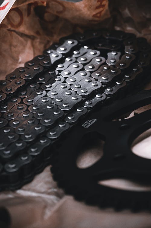 A black bike chain and a bicycle chain