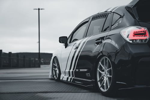 A black and white car with a rear end