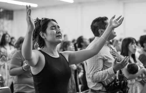 Free A diverse group of people worshipping in a religious setting in Mexico City. Stock Photo