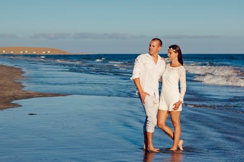 Man and Woman Near Seashore