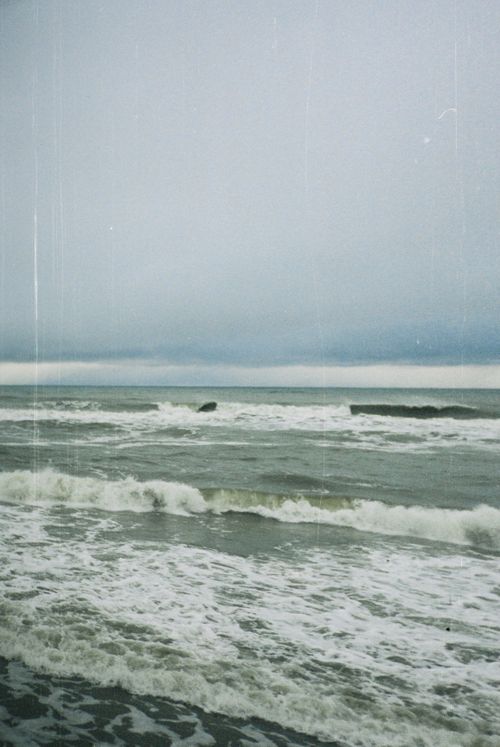 Free Moody seascape capturing waves under a foggy sky in Zelenogradsk, Russia. Stock Photo