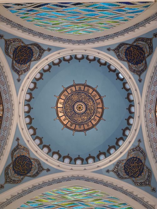 Free Intricate mosaic dome with calligraphy in an Istanbul mosque interior. Stock Photo