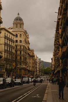 A tourist looking at a map in the Gothic Quarter, illustrating effective Barcelona travel tips.