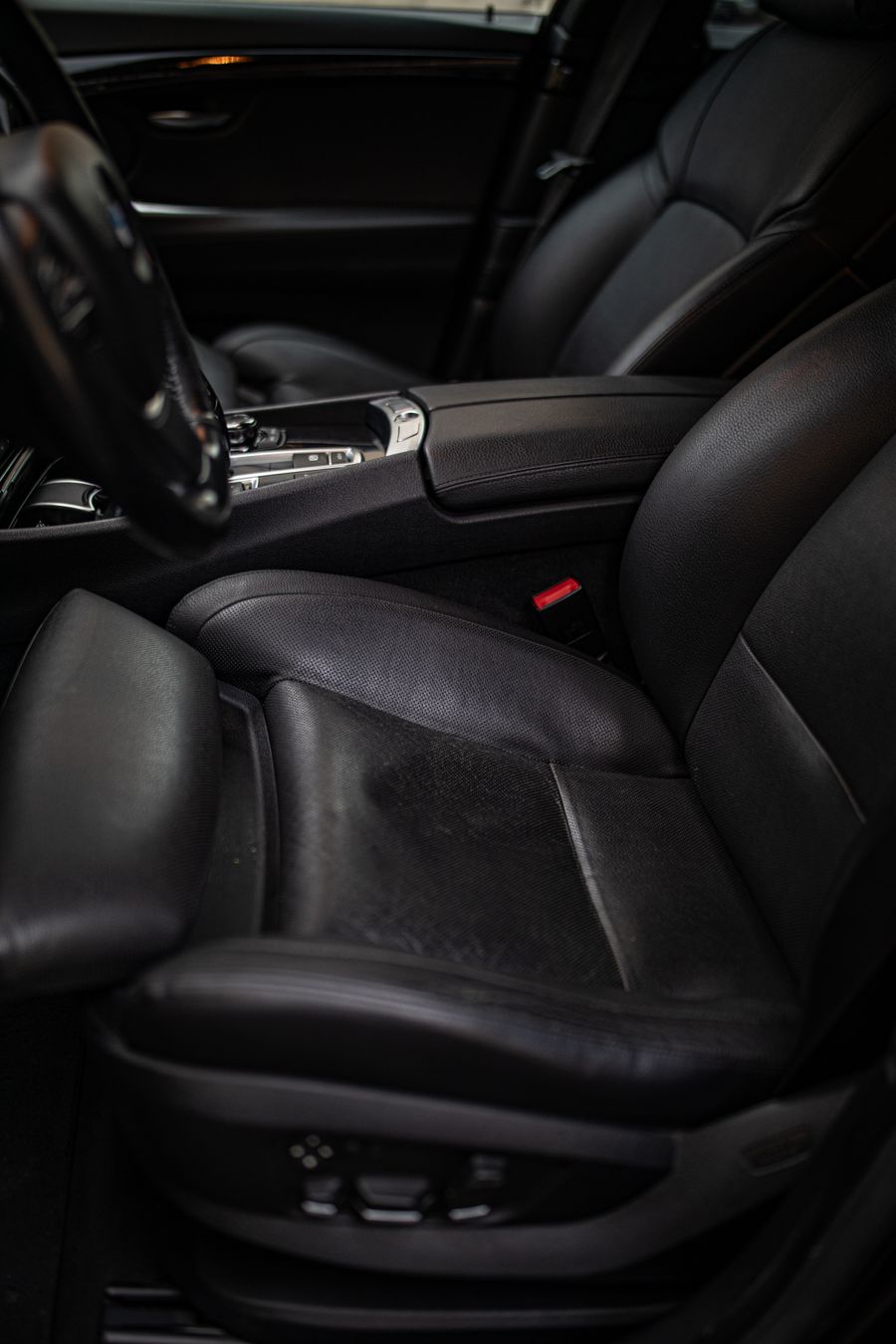 Clean black leather seats inside a luxury car