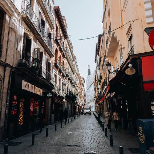 Free Captivating urban alleyway in Madrid capturing the essence of Spanish architecture. Stock Photo