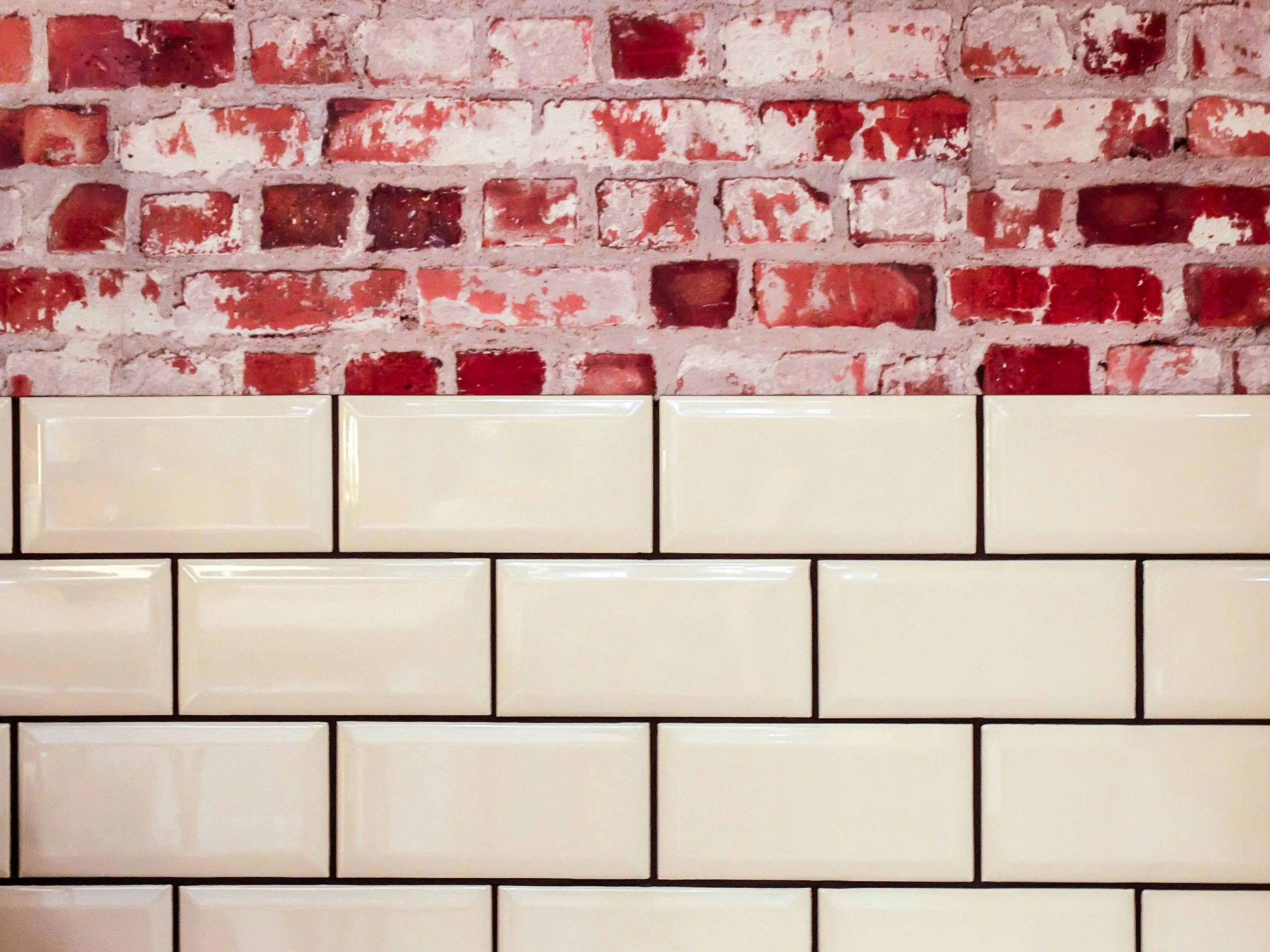 cream and red brick backsplashes