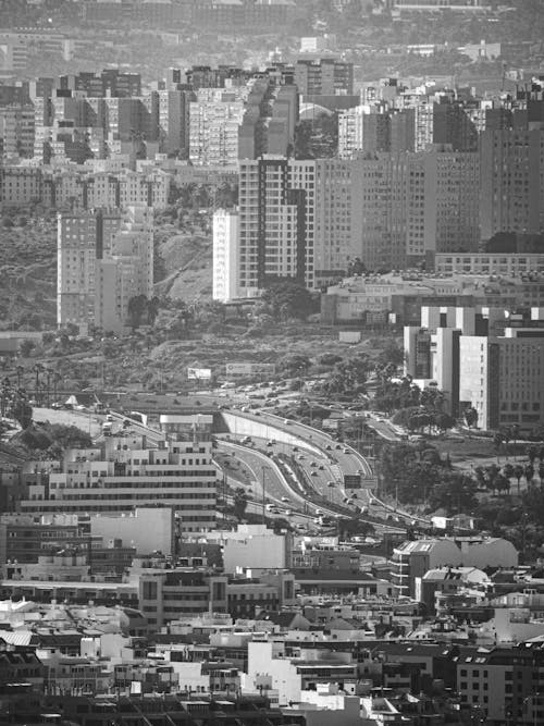 Black and white photo of cityscape with buildings