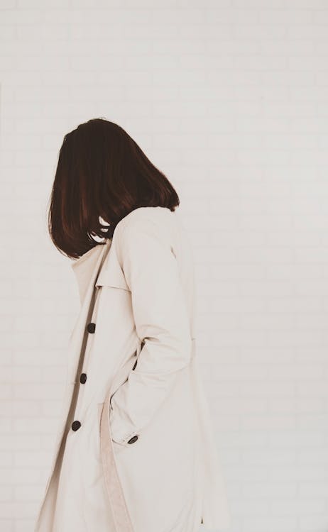 Free Woman in White Coat on a white background Stock Photo