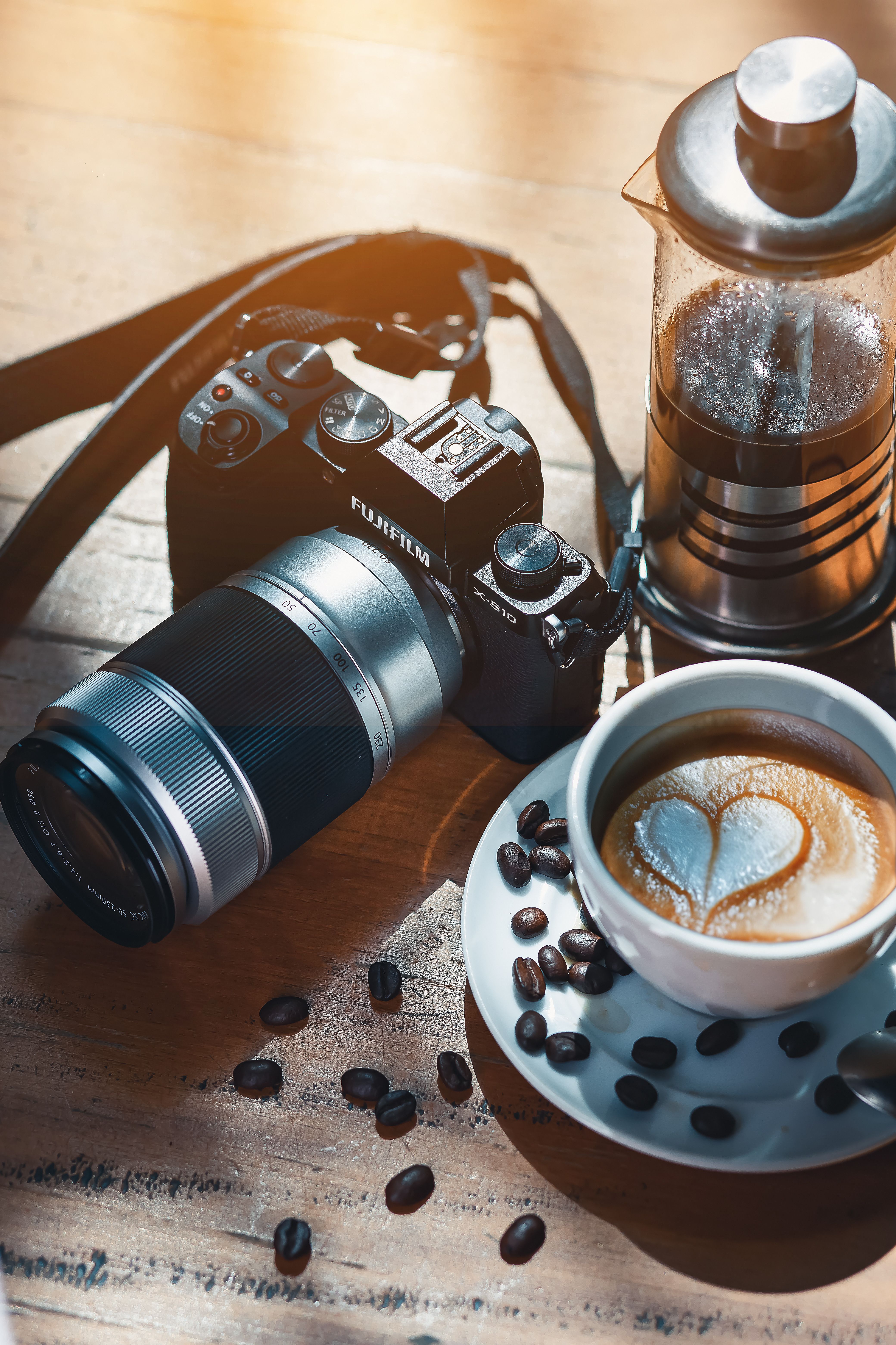 Coffee and Camera at Cafe · Free Stock Photo