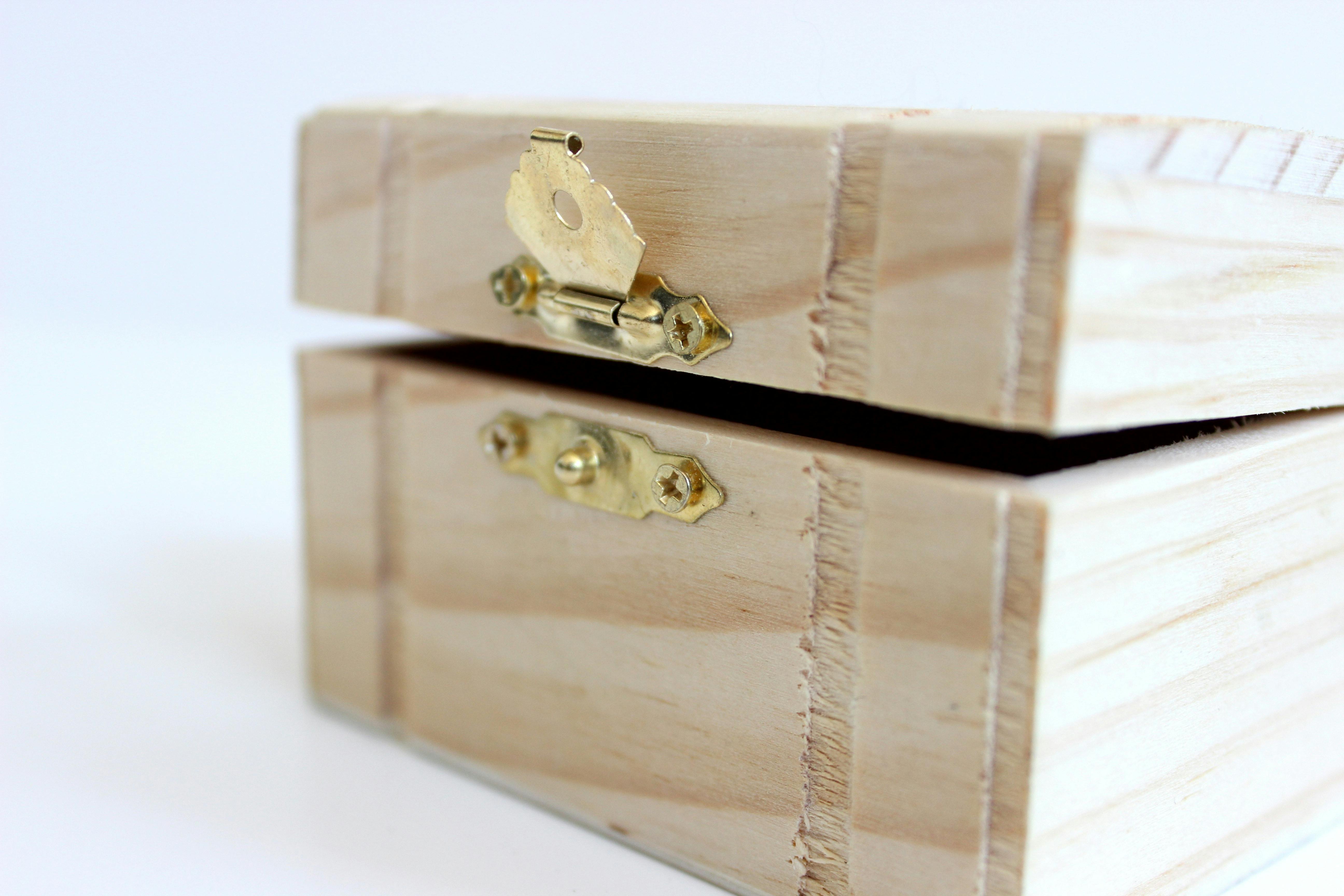 brown wooden storage box on white box