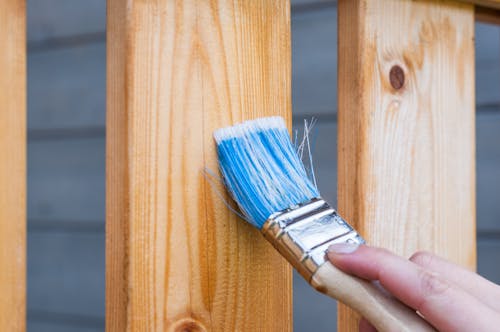 Free Person Holding Paintbrush Stock Photo