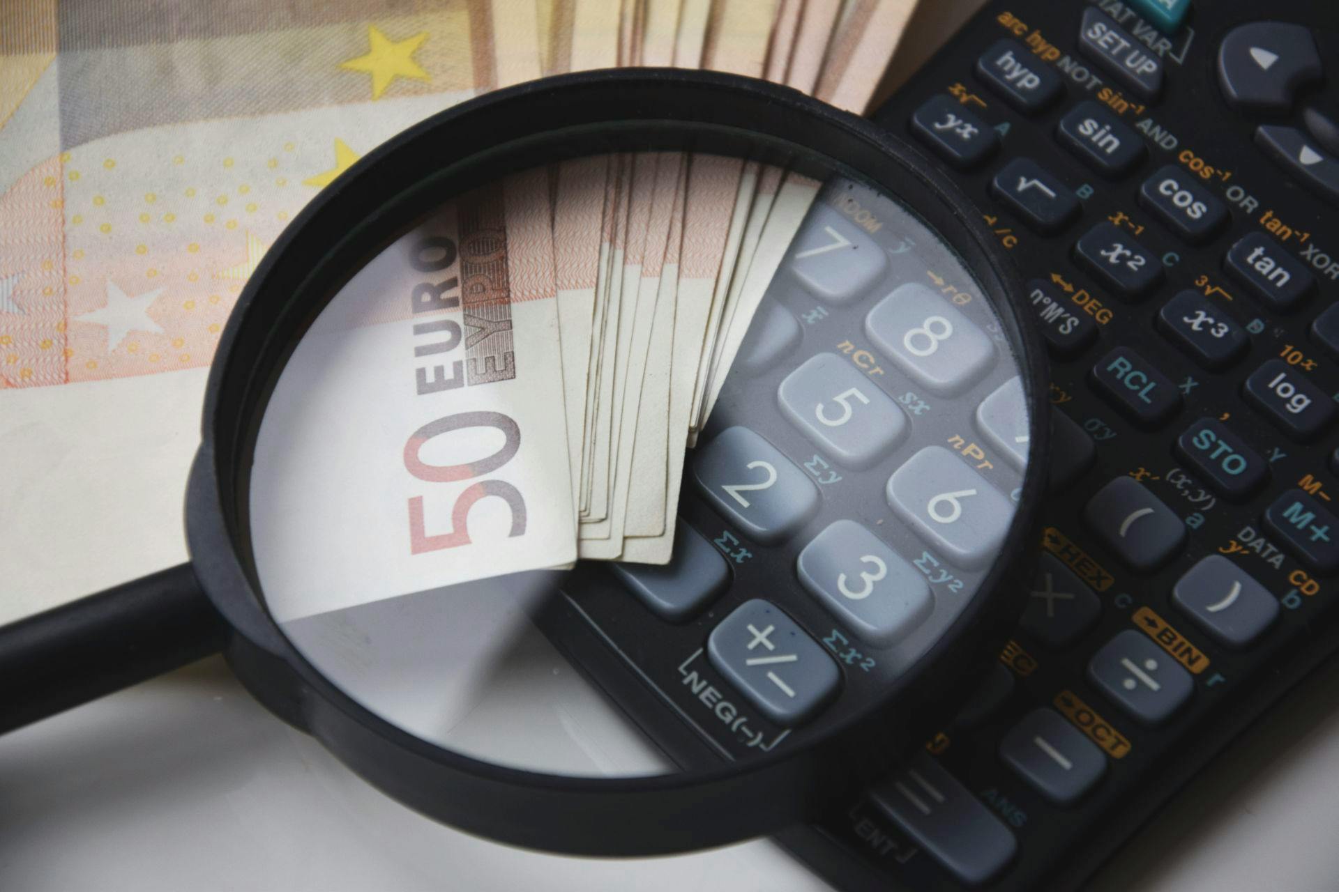 50 Euro Banknote Beside Black Calculator