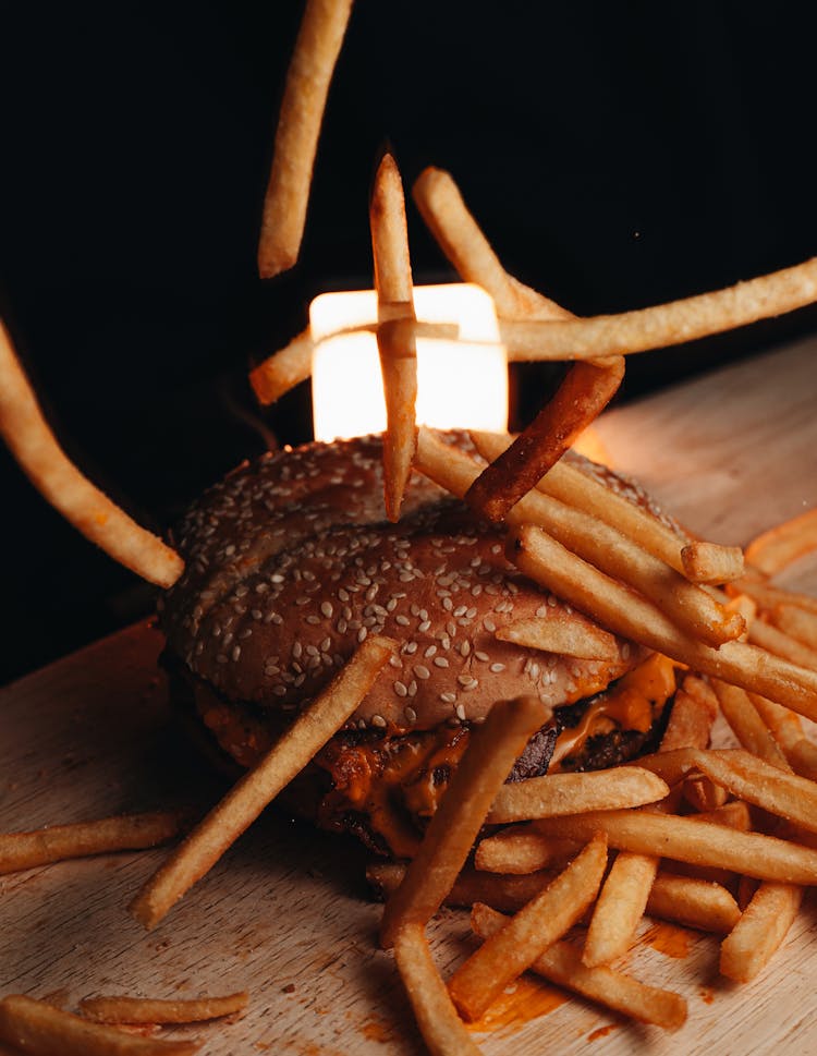 Fries Falling On A Burger