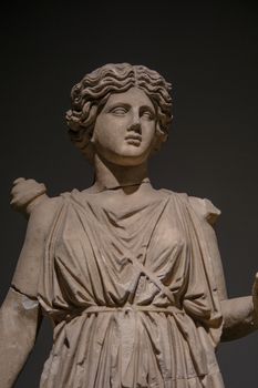Classical Greek statue displayed in Antalya Museum, Turkey, showcasing ancient artistry.