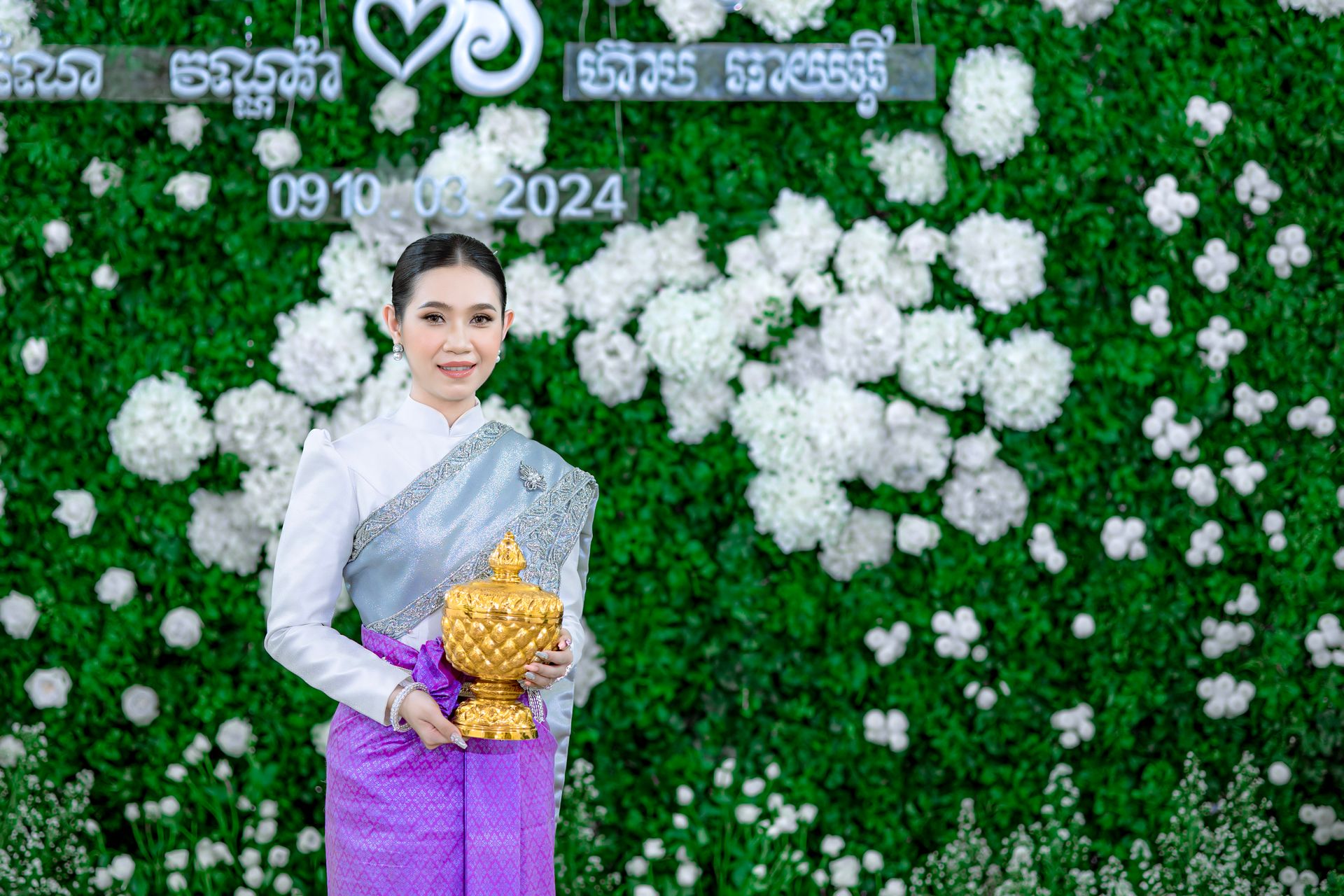 Portrait of a Bride Holding a Gold Urn