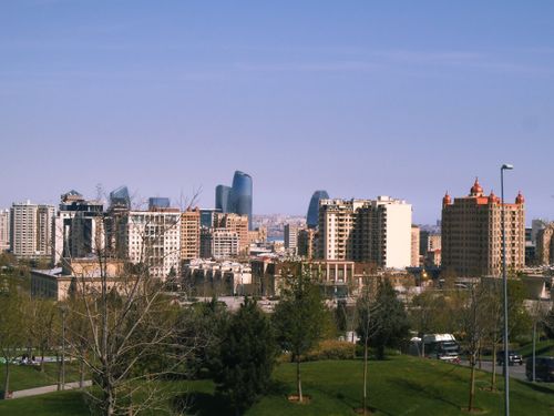 Free Cityscape of Baku, Azerbaijan featuring modern architectural landmarks and lush greenery. Stock Photo