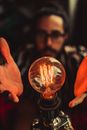 Man About to Hold Plasma Ball