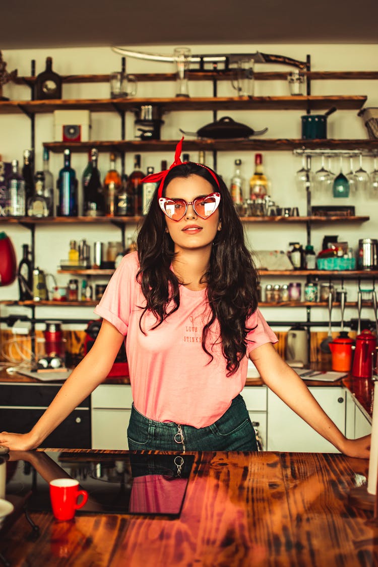 Woman Standing Beside Counter