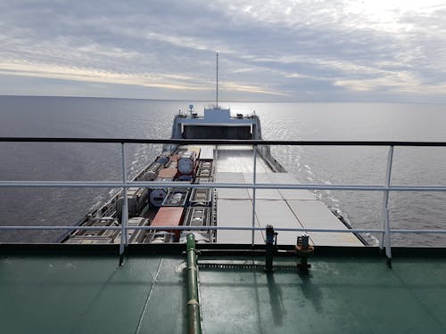 Photo of Cargo Ship on Body of Water