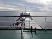 Photo of Cargo Ship on Body of Water