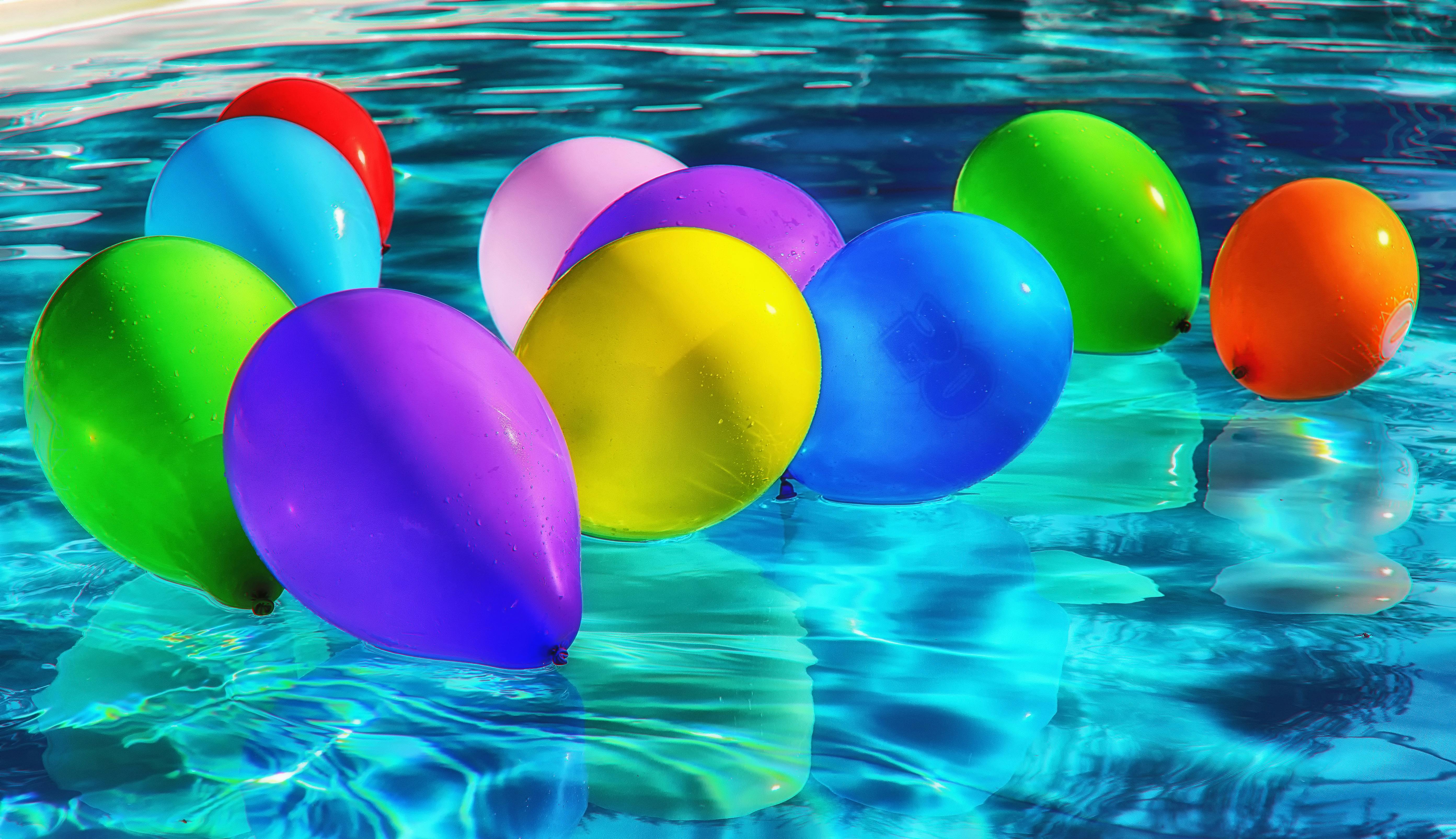 Purple Yellow and Blue Balloon on Swimming Pool \u00b7 Free Stock Photo