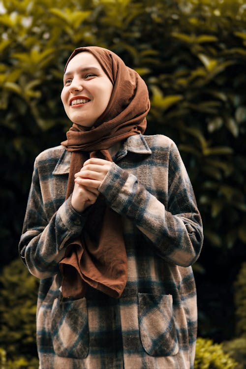 Smiling Woman in Hijab and Jacket
