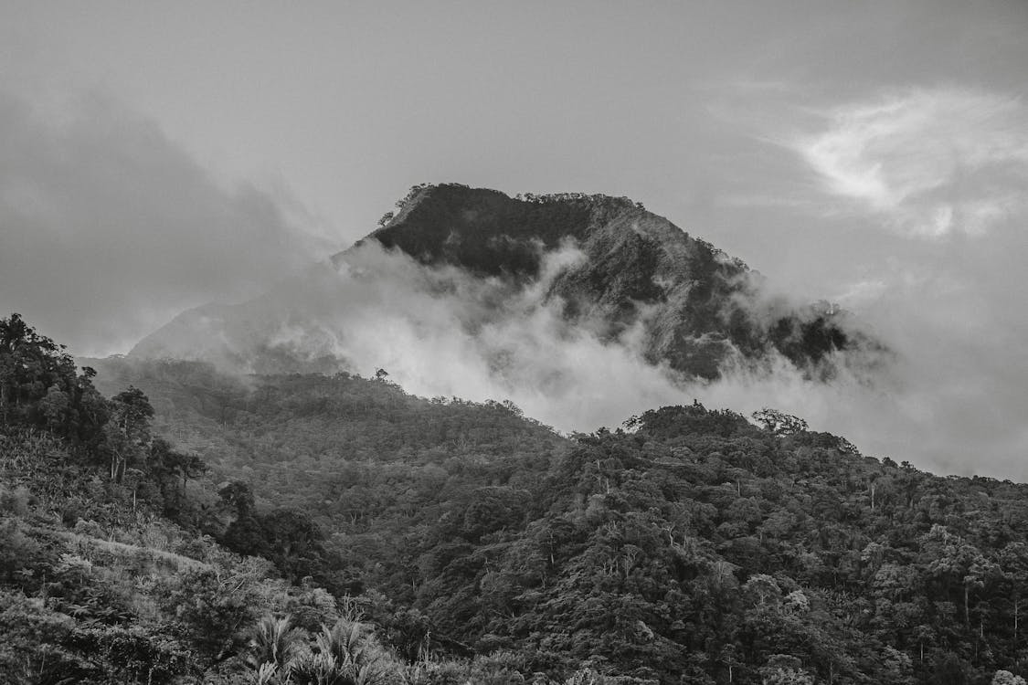 Free Grayscale Photography Of Mountain With Clouds Stock Photo