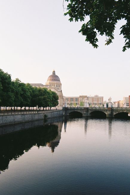 Scenic view of Berlin Cathedral reflecting in the Spree River during a calm day.