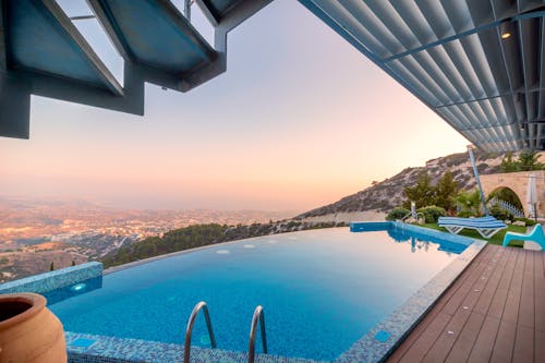 Blue Lounger Beside Swimming Pool