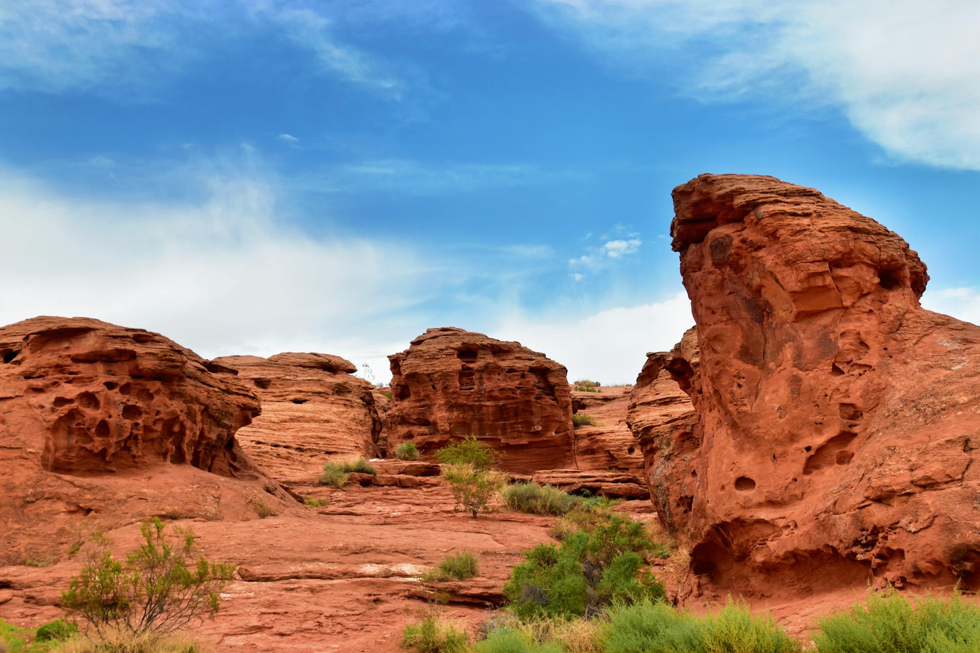 Explore the breathtaking red rock formations under a vivid blue sky in St. George, Utah.