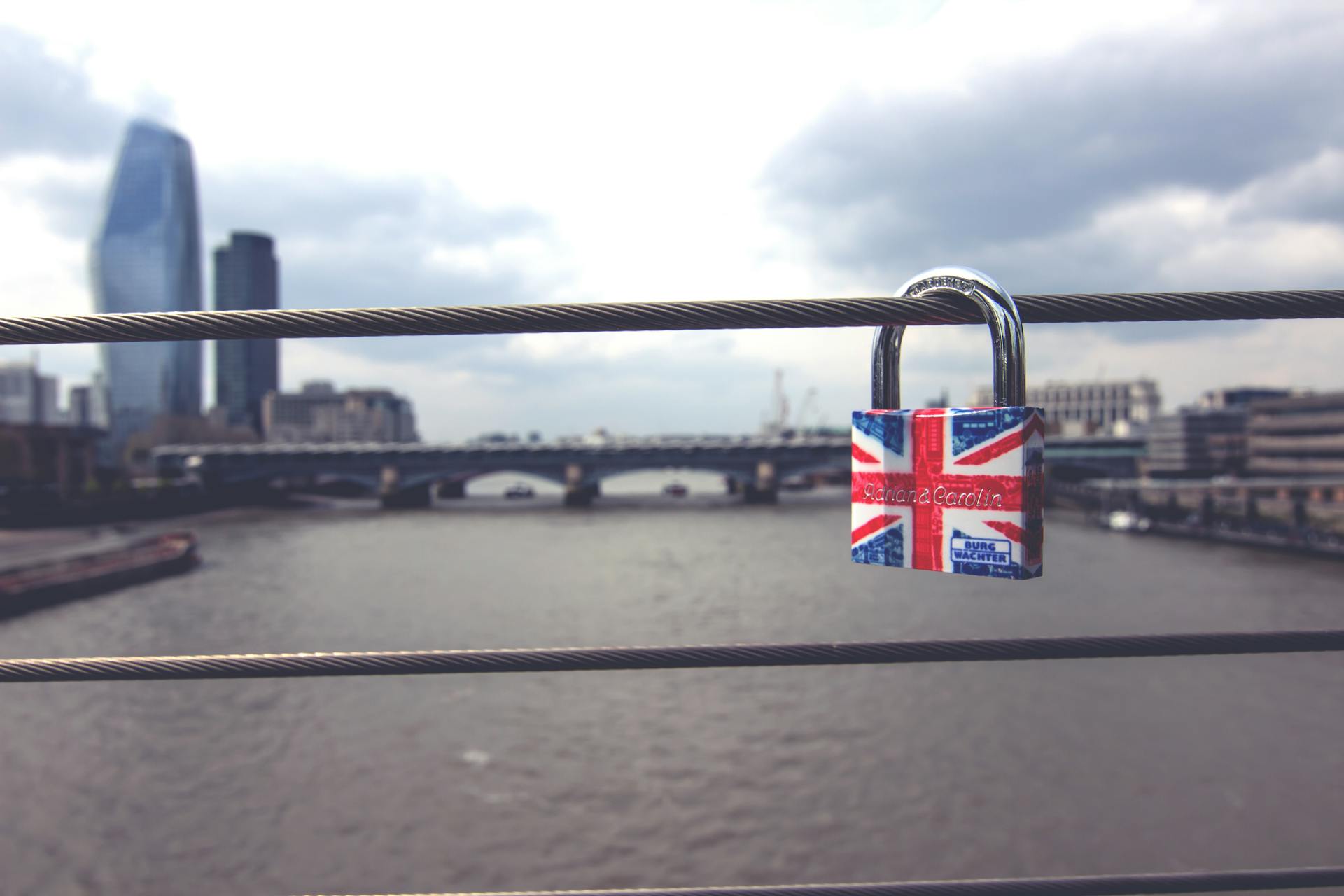 Padlock On Grey Metal Cable