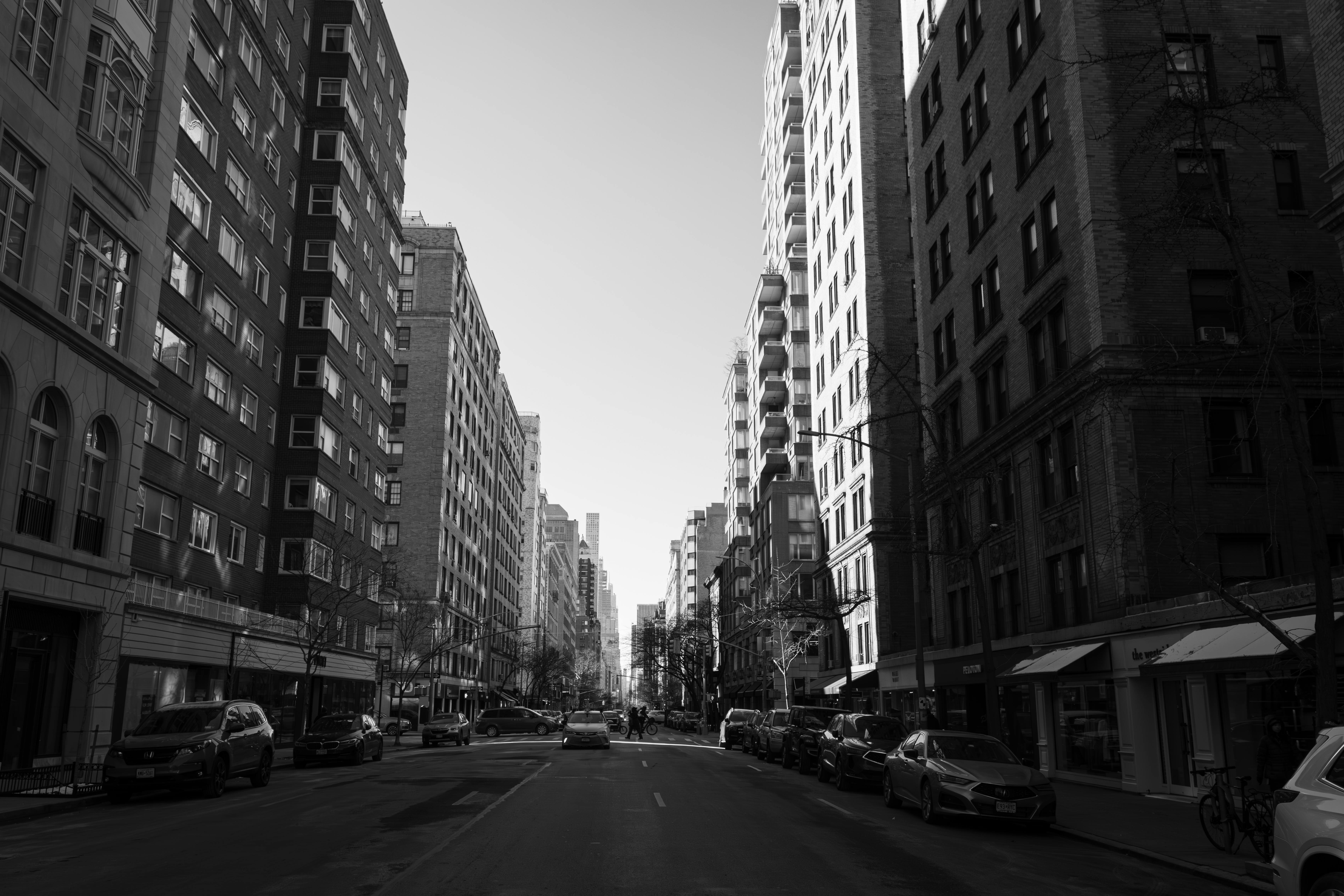 Urban cityscape in black and white capturing a quiet New York City street.