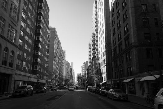 Urban cityscape in black and white capturing a quiet New York City street.