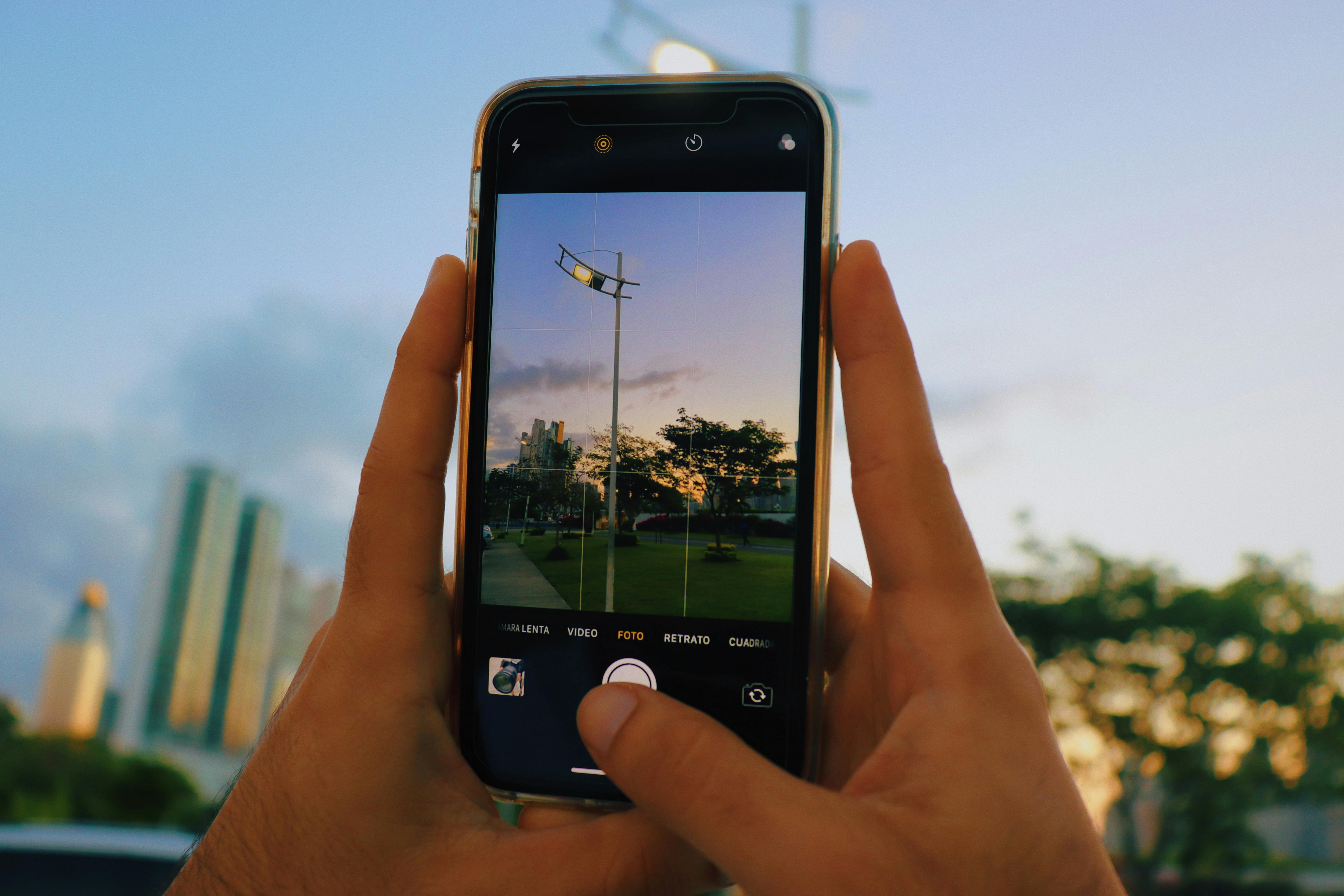 Person Holding Black Smartphone Taking Picture · Free Stock Photo