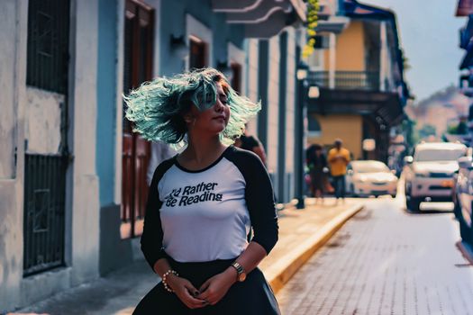 Woman Walking At The Street