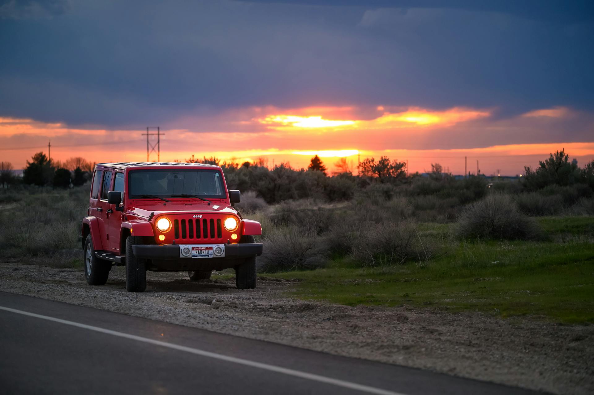 Red Jeep Suv Beside Road