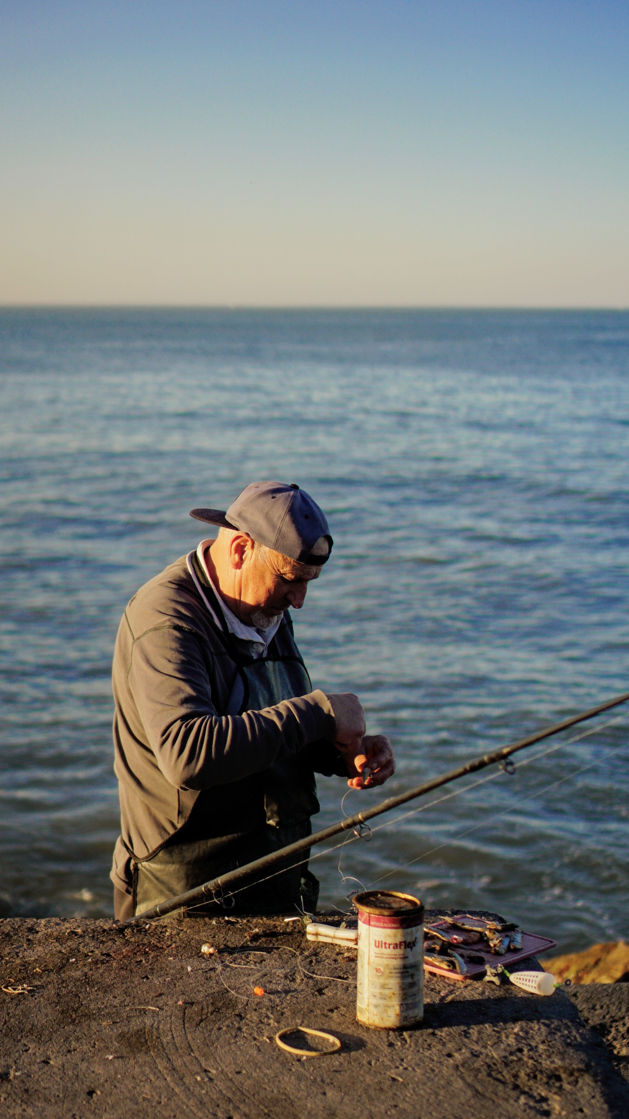 A Man with a Fishing Rod · Free Stock Photo