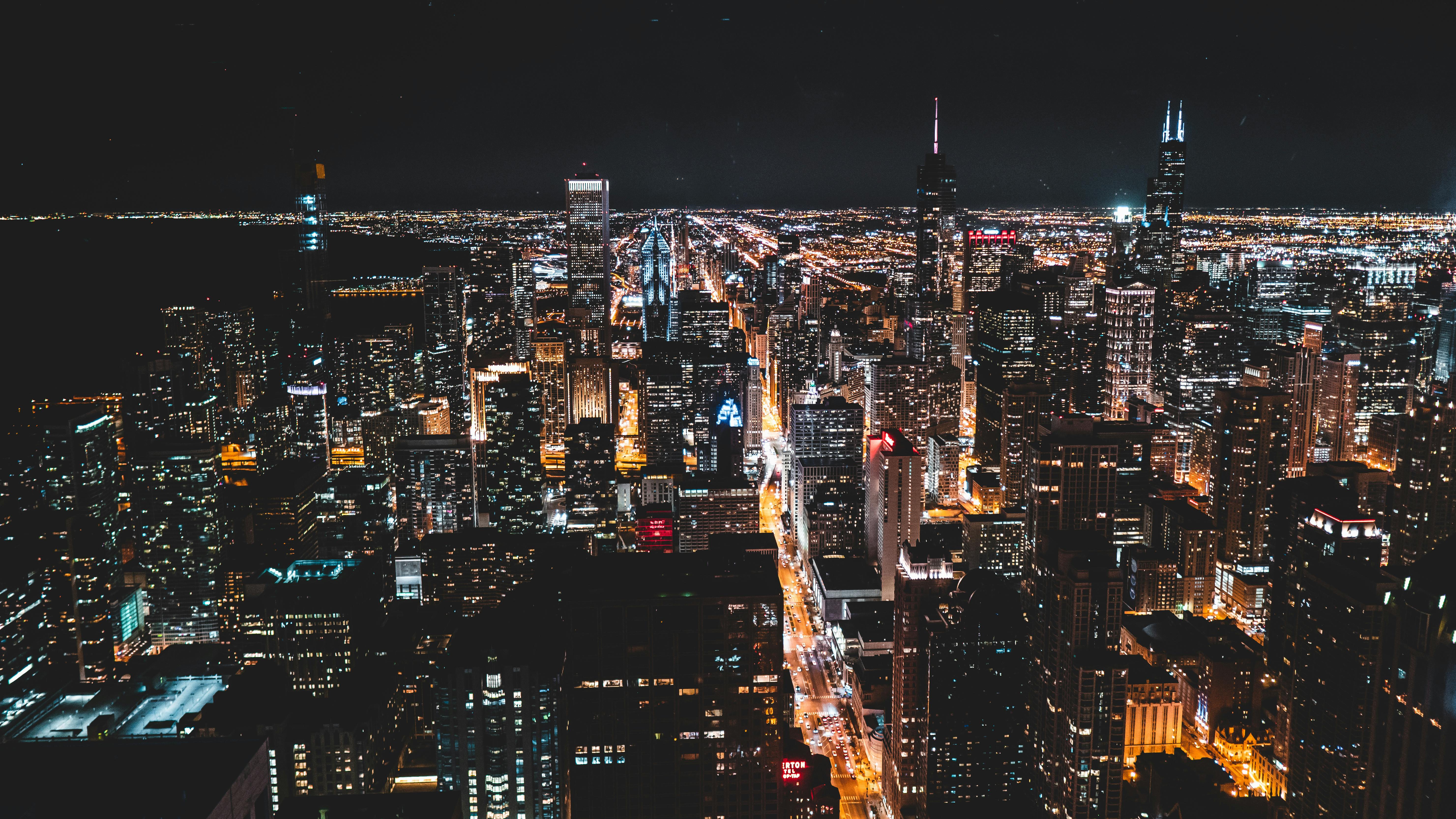 High Rise Buildings During Nighttime · Free Stock Photo