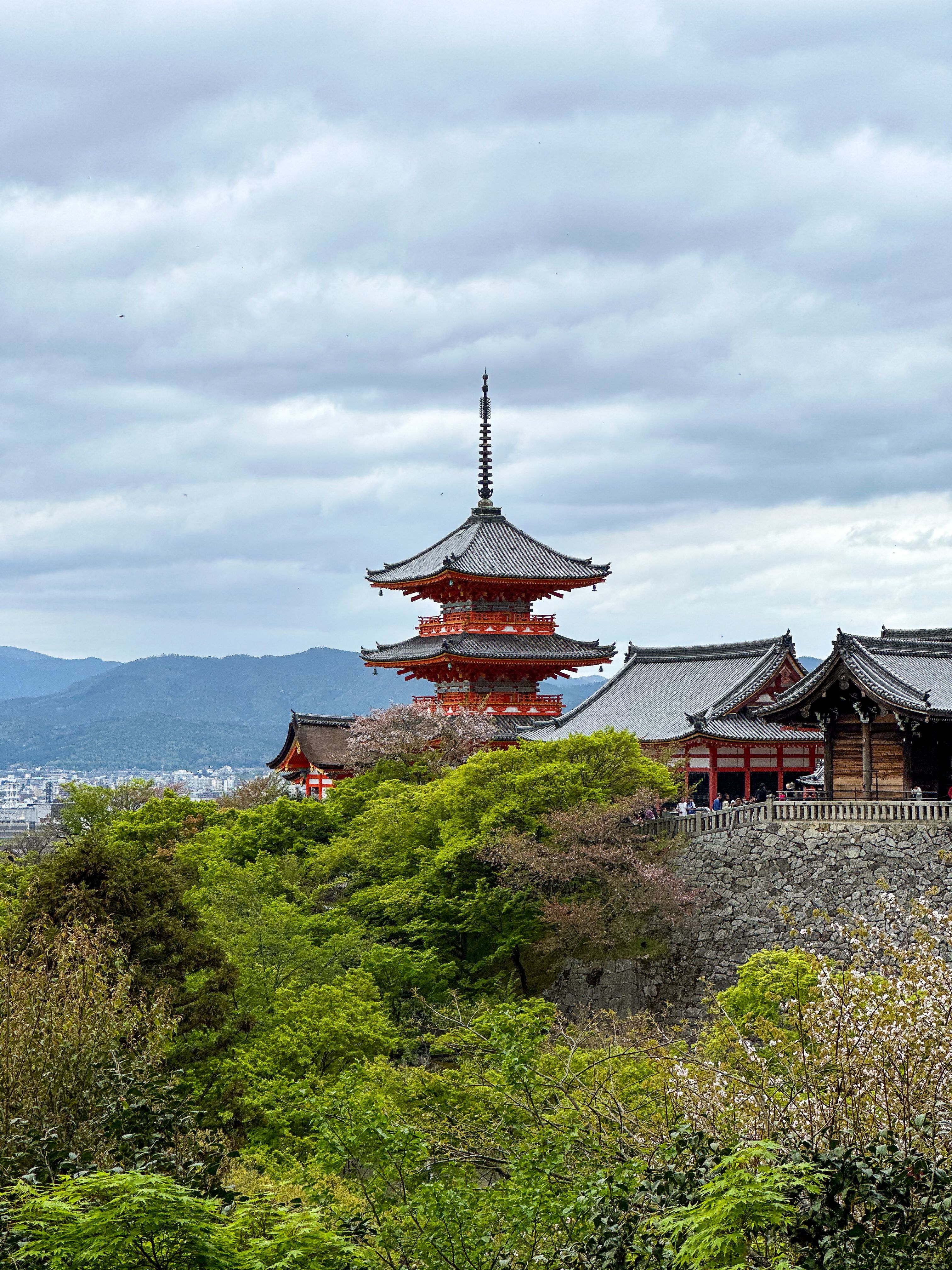 Red and Black Temple Surrounded by Trees Photo · Free Stock Photo