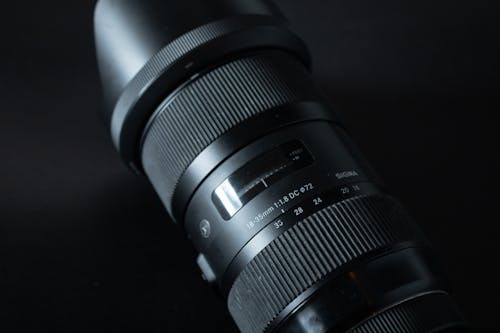Black and White Camera Lens on Black Background