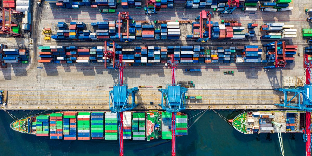 Inside a shipping container being loaded