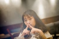 Woman Pointing Together Her Index Fingers