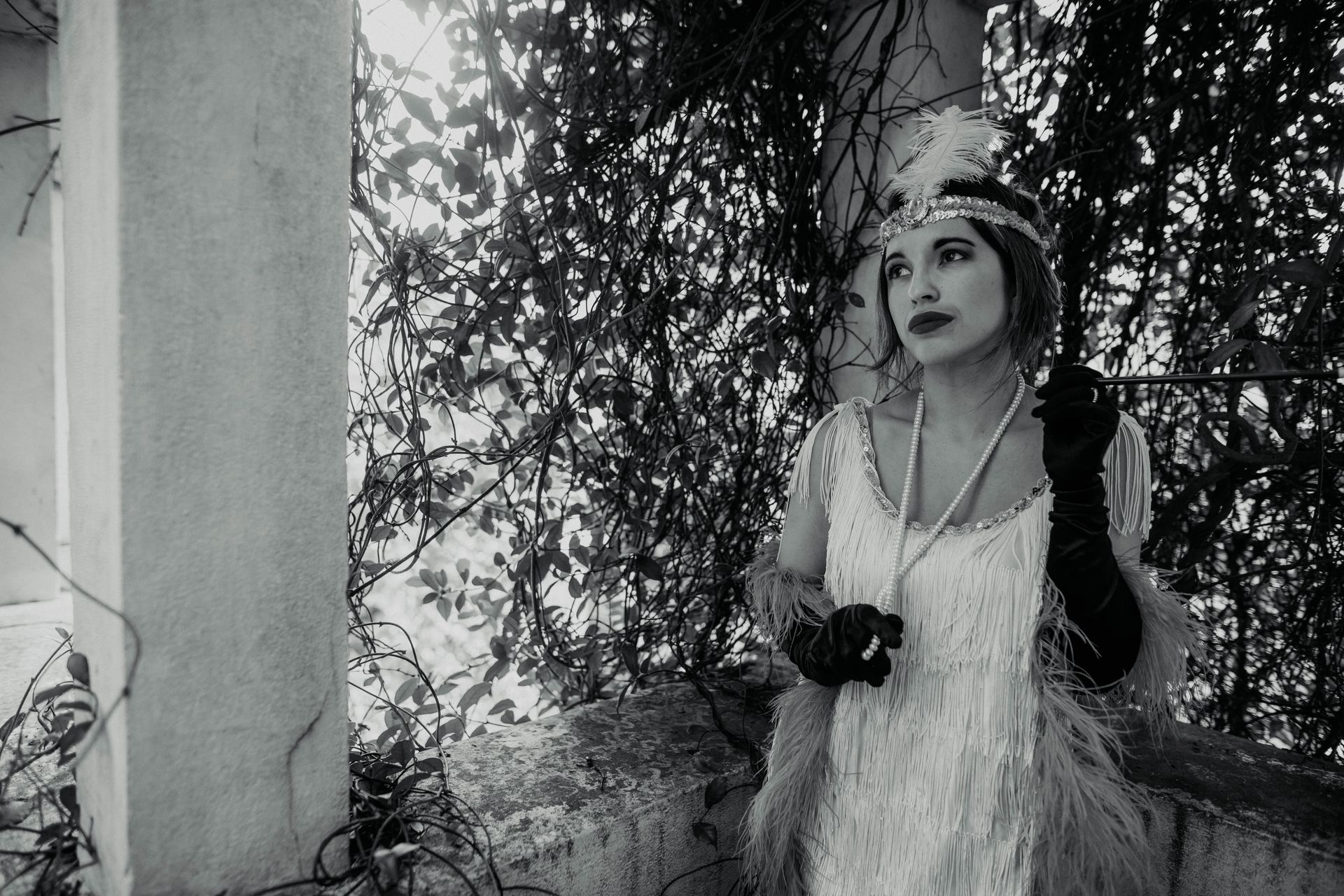 Retro-inspired black and white portrait of a woman in flapper attire, Buenos Aires.