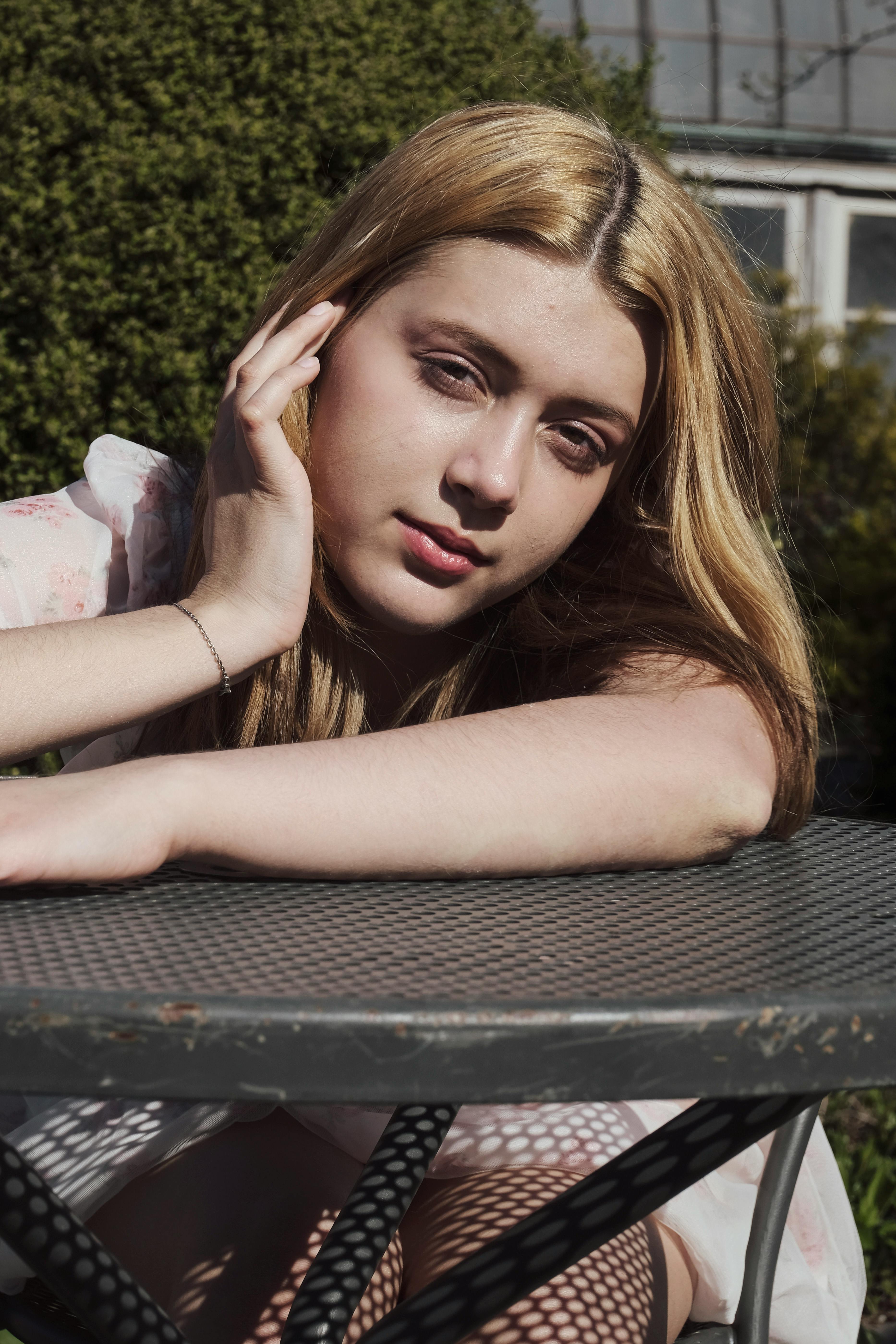 close up of a woman in a park