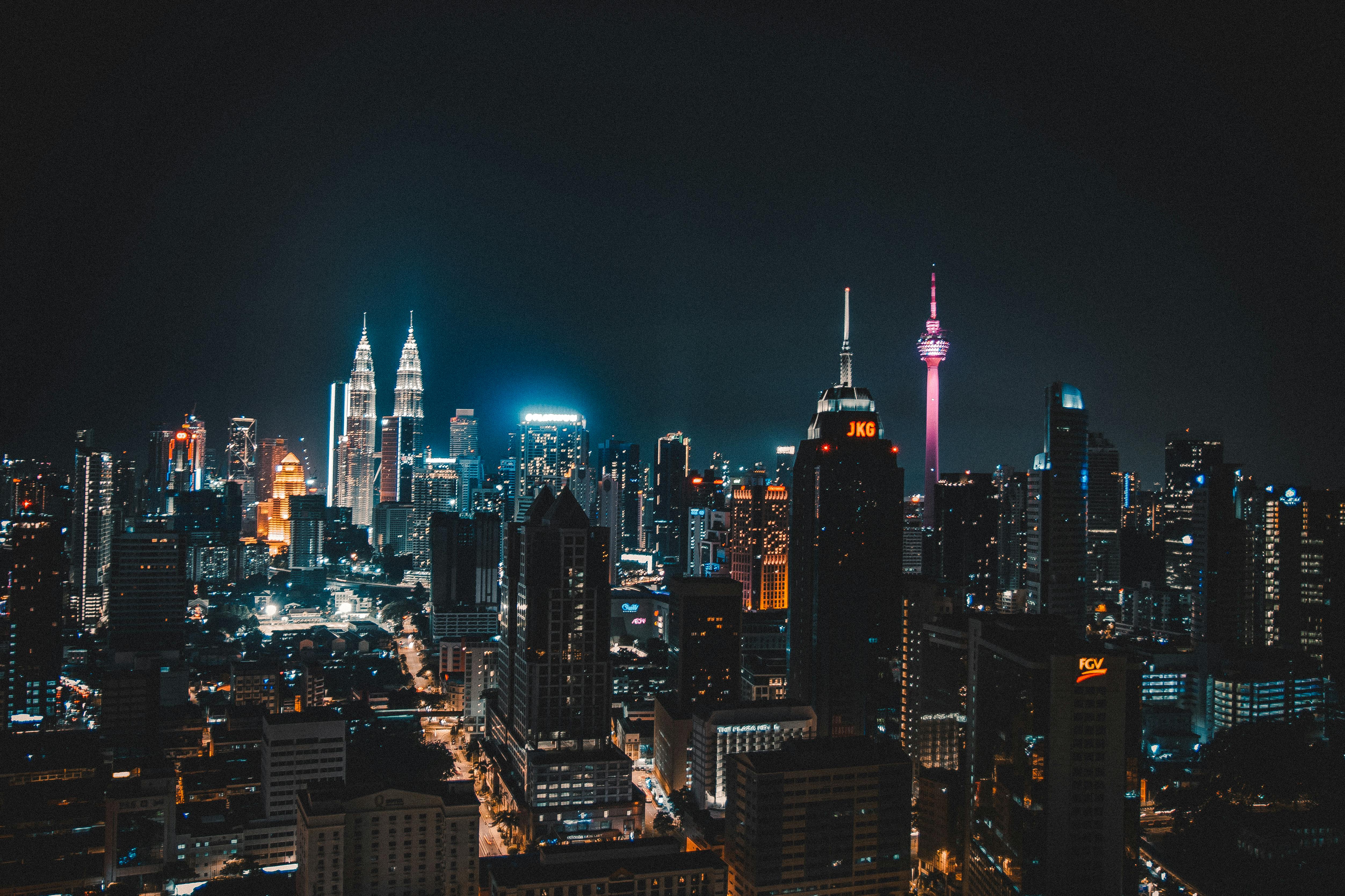 High Rise City Building during Night Time Photo \u00b7 Free Stock Photo